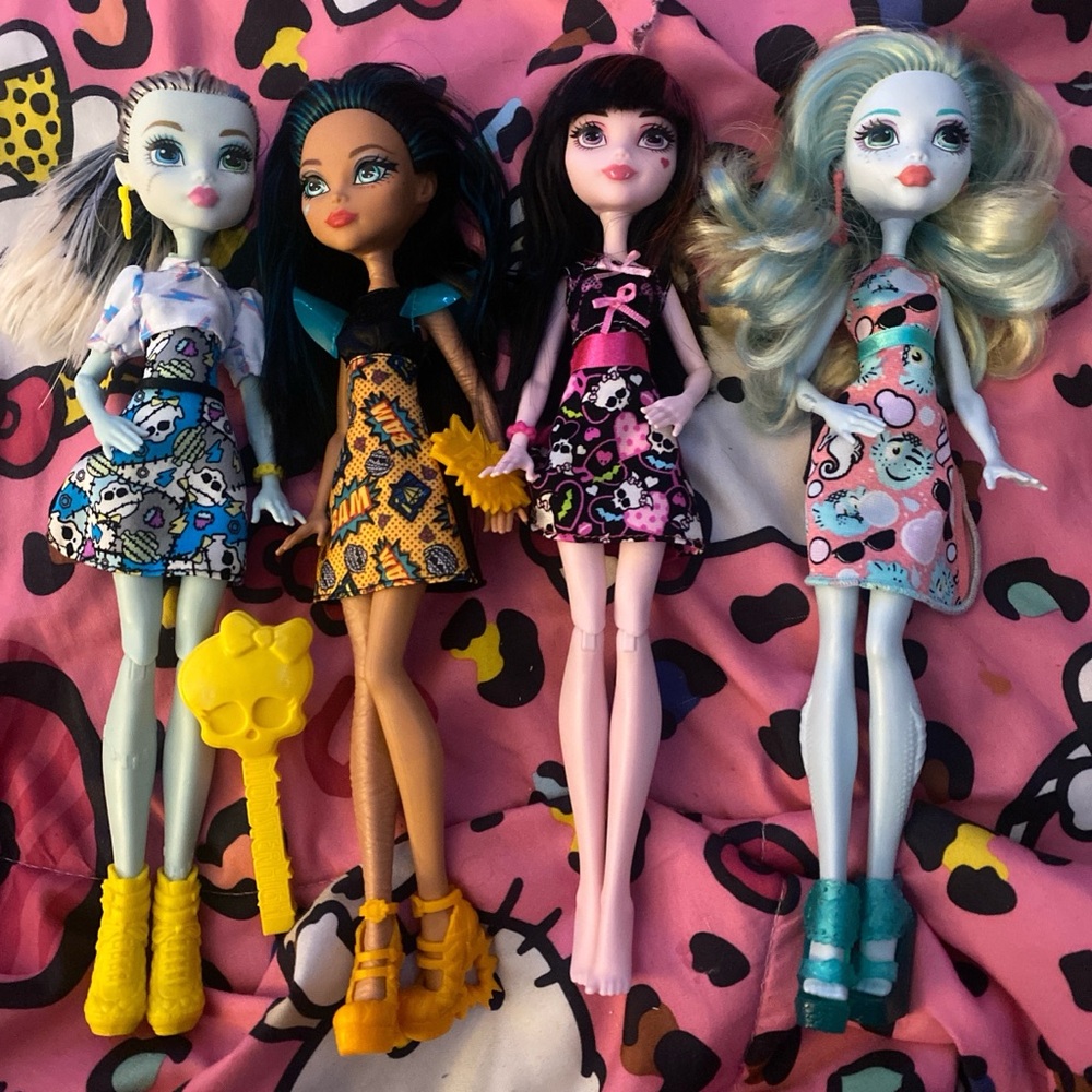 Set of Four Monster High Dolls with Colorful Dresses